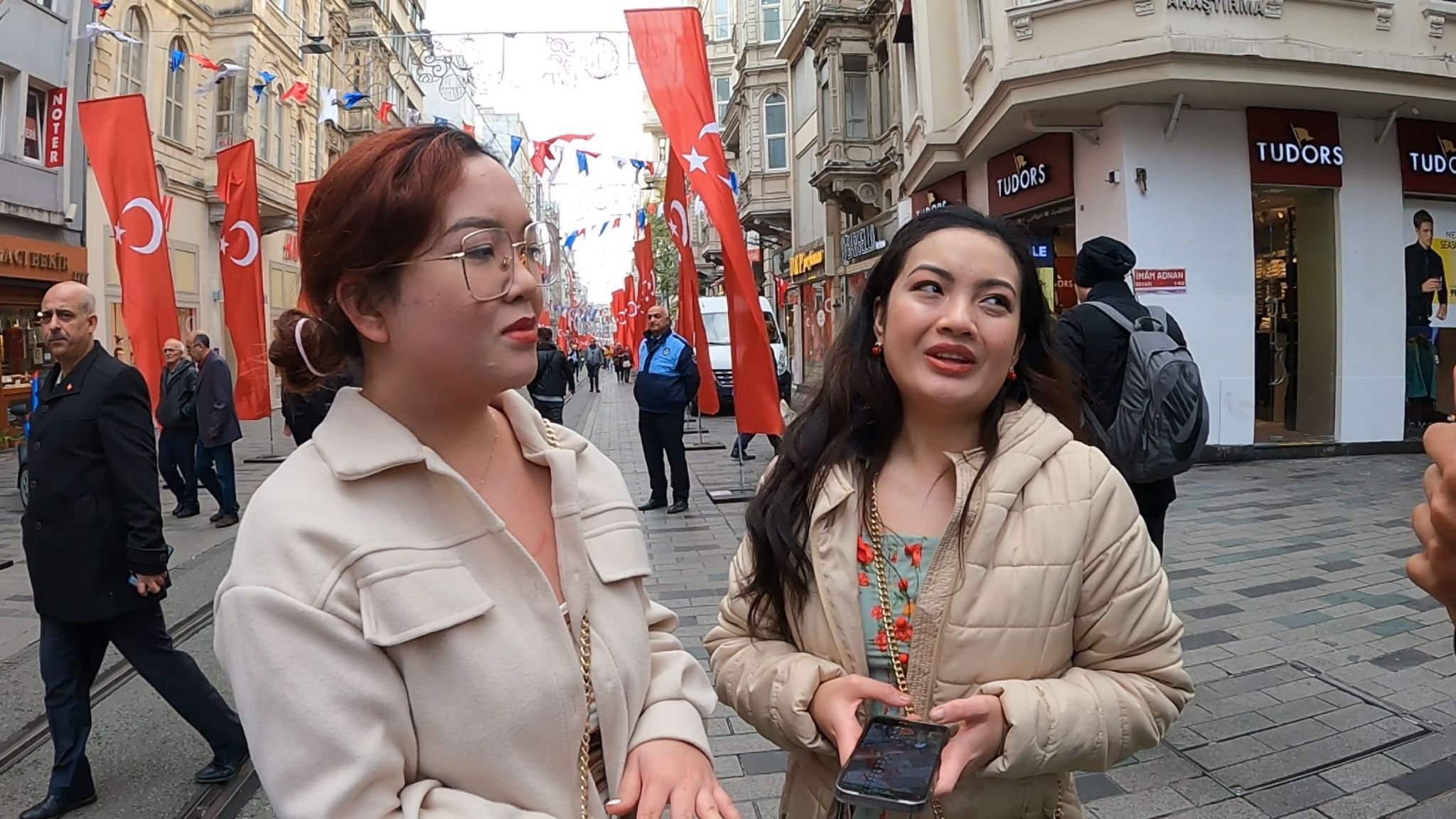 Filipino tourists Alissa and Angelica Marquez speak in an interview, on Istiklal Street, in Istanbul, Türkiye, Nov. 16, 2022. (PHOTO BY BULUT YAMANDAĞ)