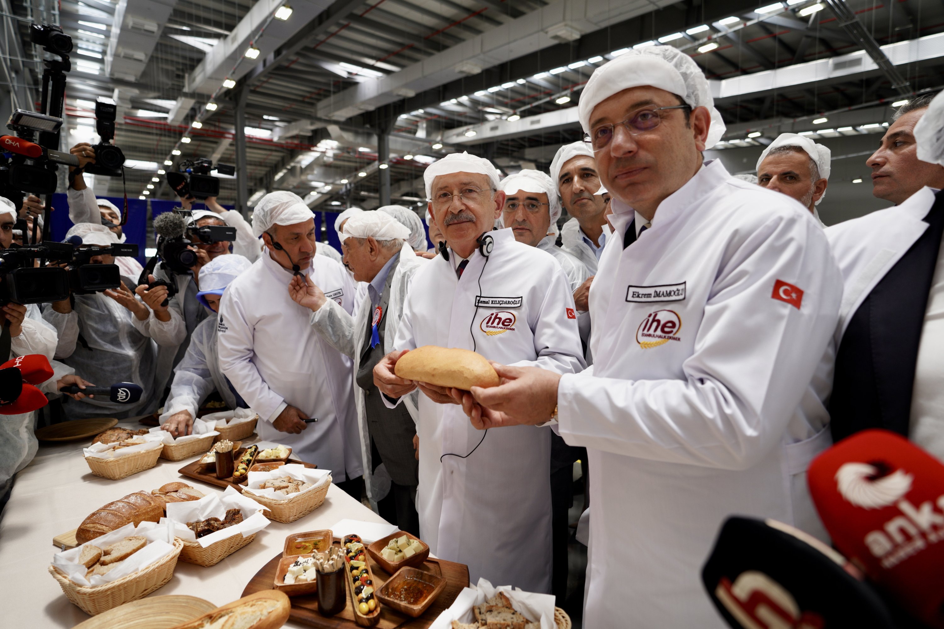 Istanbul Mayor Ekrem Imamoğlu (R) and CHP Chair Kemal Kılıçdaroğlu (2nd R) attend the opening ceremony for the now unused bread factory, Istanbul, Türkiye, July 23, 2022. (Photo by Barış Savaş)