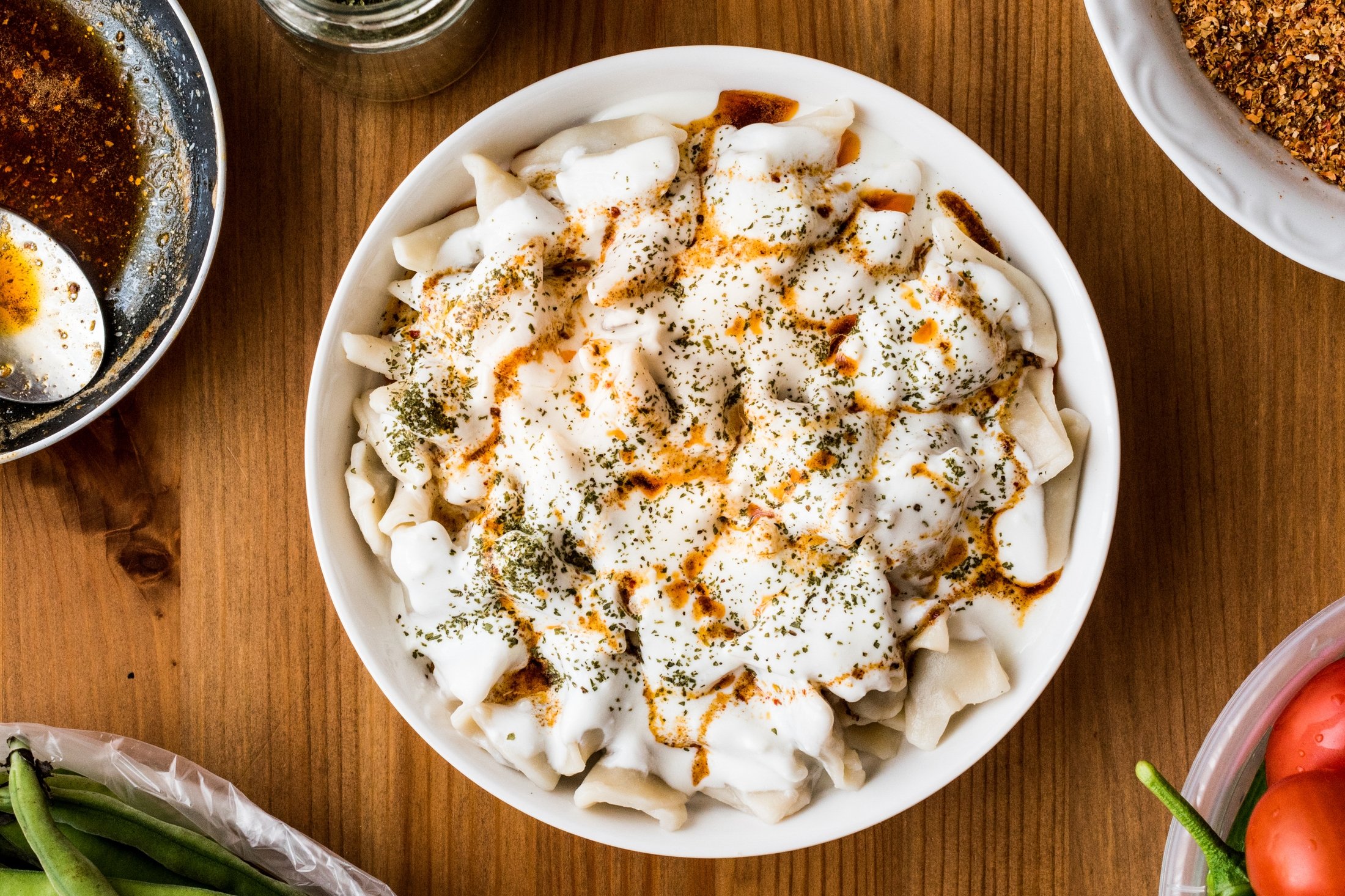 251512 Traditional Turkish mantı with yogurt and butter sauce. (Shutterstock Photo)